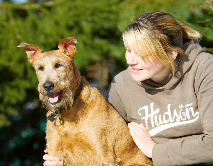 Animal, Animals, Blonde, Canine, Canines, Dog, Dogs, Irish Terrier, Kate, Land Mammal, Land Mammals, Play, Playing, Playtime, Smile, Smiling, Terrestrial Mammal, Terrestrial Mammals, Terriers, Tintin, Tongue, Woman